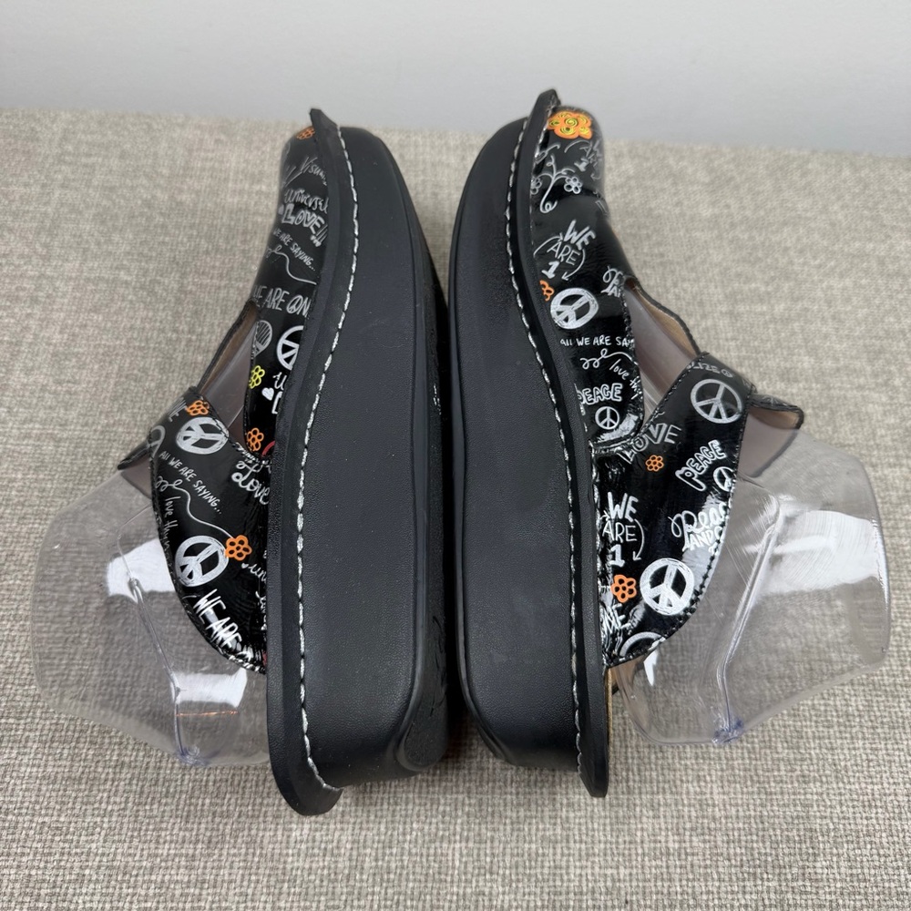 Alegria Black Floral Peace Sign Clogs - Picture 7 of 9